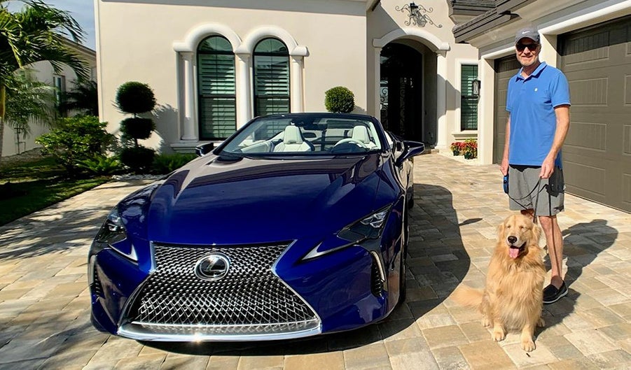 Man and Dog Delivered Lexus